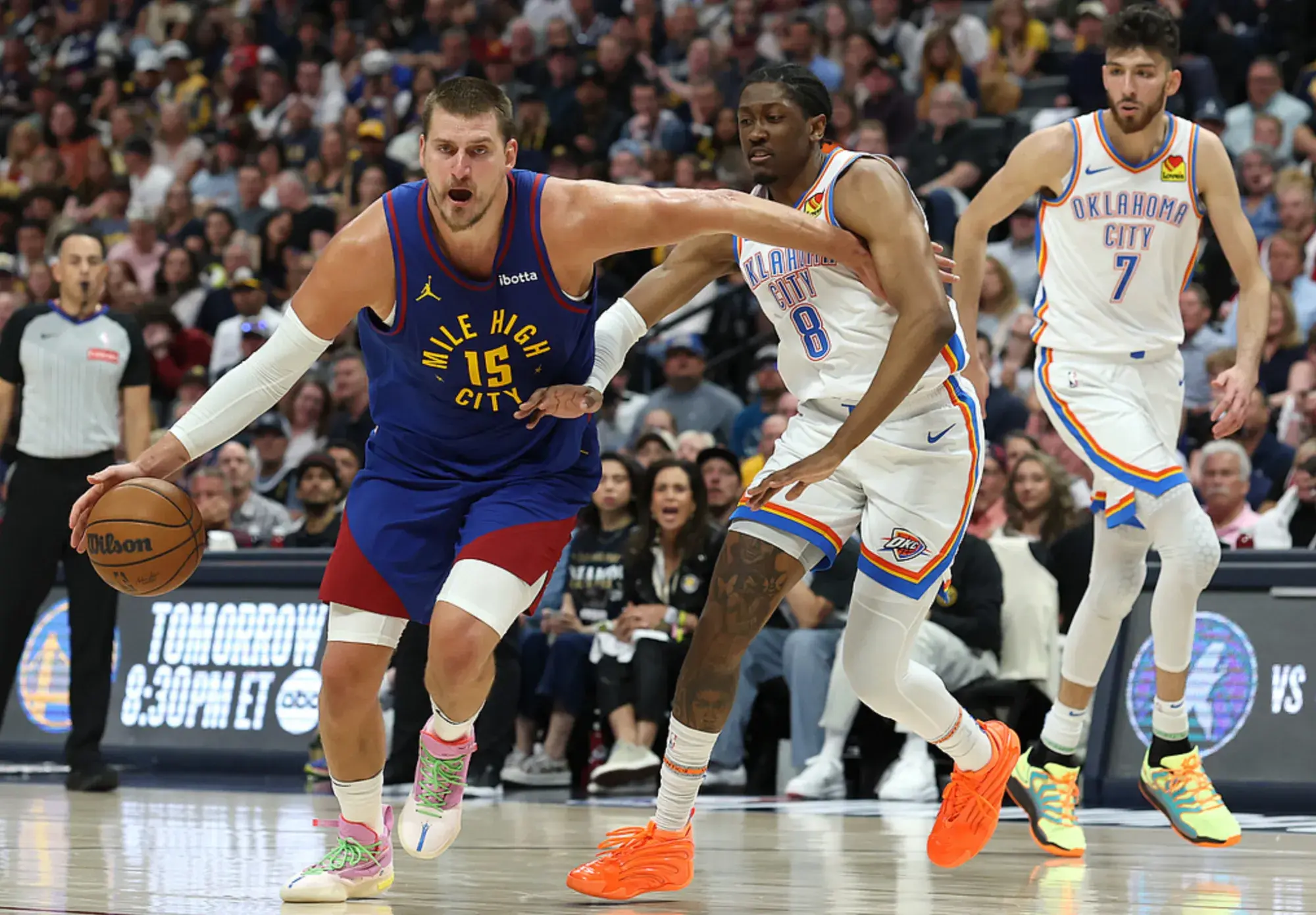 广东队鏖战热火,约基奇带队取胜 广东队鏖战热火,约基奇带队取胜